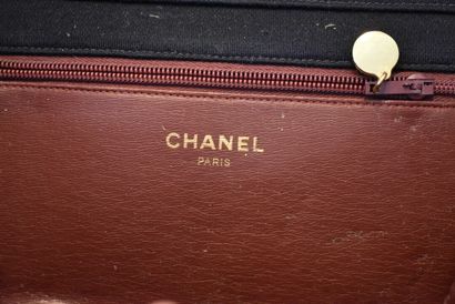 CHANEL. Navy blue jersey clutch bag with...