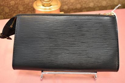 LOUIS VUITTON. Leather accessory pouch, with...