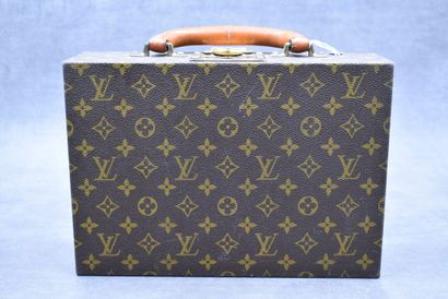 LOUIS VUITTON. Mallette a bijoux en toile...