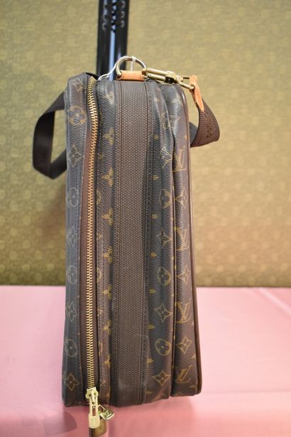 LOUIS VUITTON. Small soft suitcase in monogram...