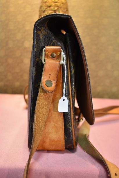LOUIS VUITTON. Cartridge bag in monogram...