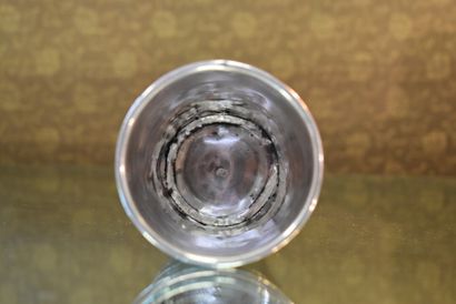 A minerva silver tumbler decorated with crossed...
