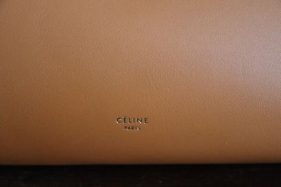 CELINE. Sac en cuir orange et noir. 
CELINE....