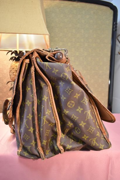 LOUIS VUITTON. Hunting bag in monogrammed...