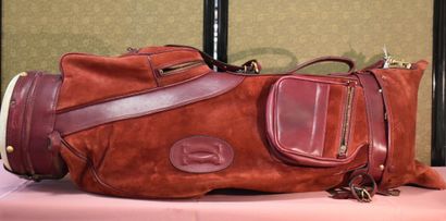 CARTIER. Golf club bag in turned skin and...
