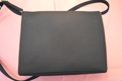 CHRISTIAN DIOR. Clutch bag in black fabric,...
