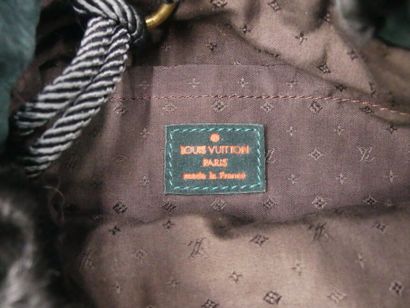Louis VUITTON. Bucket bag in astrakhan with...
