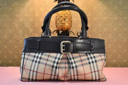 BURBERRY. Handbag in coated canvas and brown...