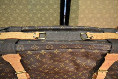 LOUIS VUITTON. Small soft suitcase in monogram...