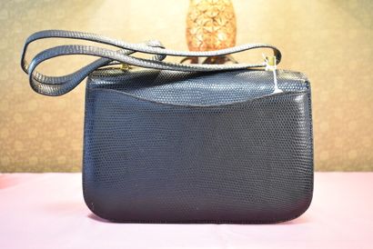 HERMES. Constance model. Black lizard handbag,...