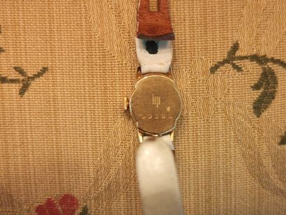 LIP. Lady's watch with gold case, eagle head...