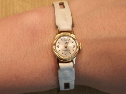 LIP. Lady's watch with gold case, eagle head...