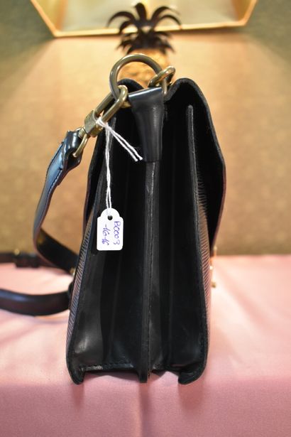 LOUIS VUITTON. Double sided handbag in black...