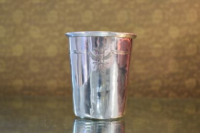 A minerva silver tumbler decorated with crossed...