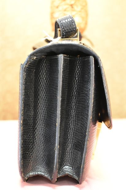 HERMES. Constance model. Black lizard handbag,...