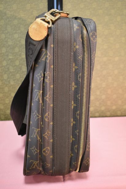LOUIS VUITTON. Small soft suitcase in monogram...