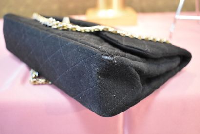 CHANEL. Classic bag with double flaps in...