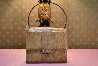 CHRISTIAN DIOR. Beige snake handbag. 

Size:...
