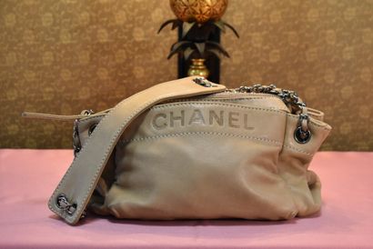 CHANEL. Small shoulder bag in beige lambskin,...
