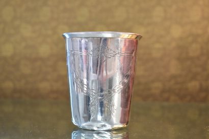 A minerva silver tumbler decorated with knotted...
