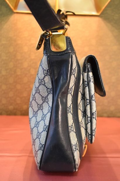 GUCCI. Shoulder bag in coated canvas and...