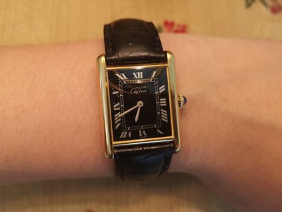 CARTIER. Gold-plated silver must-watch, mechanical...