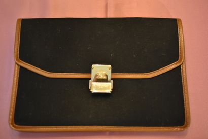 CELINE. A set of brown leather and canvas...