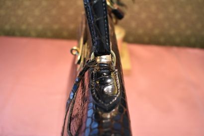 HERMES. 32cm Kelly bag in brown porosus crocodile,...