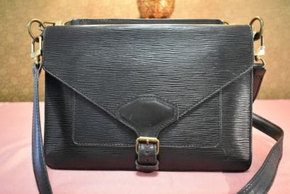 LOUIS VUITTON. Double sided handbag in black...