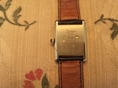 CARTIER. Gold-plated silver must-watch, mechanical...
