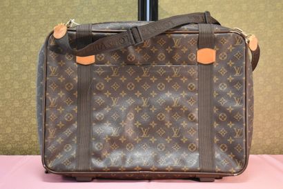 LOUIS VUITTON. Small soft suitcase in monogram...