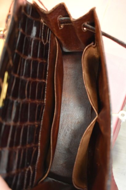 HERMES. 32cm Kelly bag in brown porosus crocodile,...