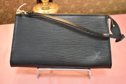 LOUIS VUITTON. Leather accessory pouch, with...