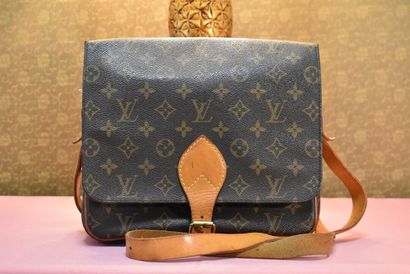 LOUIS VUITTON. Cartridge bag in monogram...