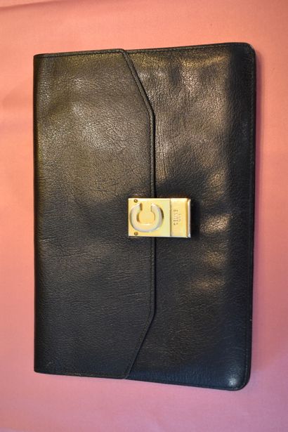 CELINE. A set of brown leather and canvas...