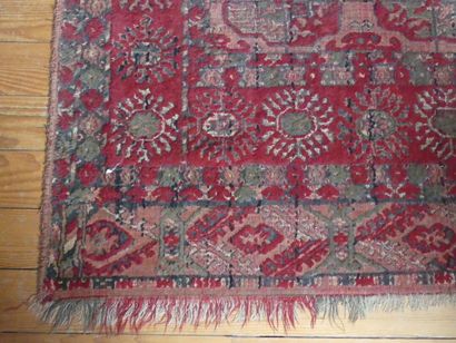 Tapis oriental à motifs de soleils, champ...