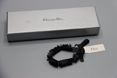 CHRISTIAN DIOR. Bracelet tubes noirs.