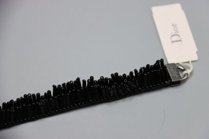 CHRISTIAN DIOR. Bracelet tubes noirs.