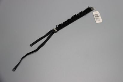 CHRISTIAN DIOR. Bracelet tubes noirs.