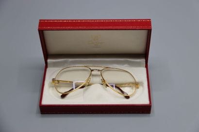 CARTIER, Paris. Paire de lunettes en métal...