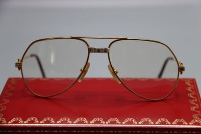 CARTIER, Paris. Paire de lunettes en métal...