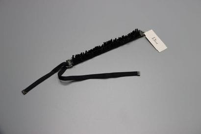 CHRISTIAN DIOR. Bracelet tubes noirs.