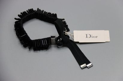 CHRISTIAN DIOR. Bracelet tubes noirs.