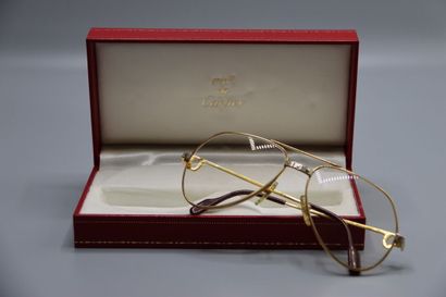 CARTIER, Paris. Paire de lunettes en métal...