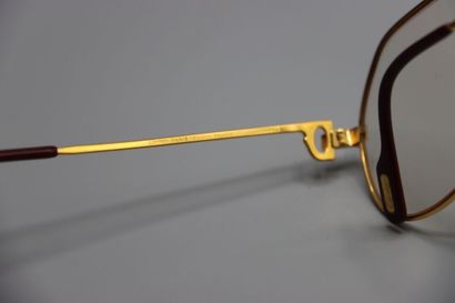 CARTIER, Paris. Paire de lunettes en métal...