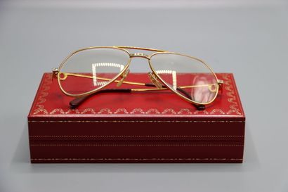 CARTIER, Paris. Paire de lunettes en métal...