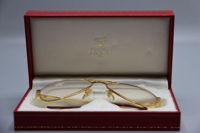CARTIER, Paris. Paire de lunettes en métal...