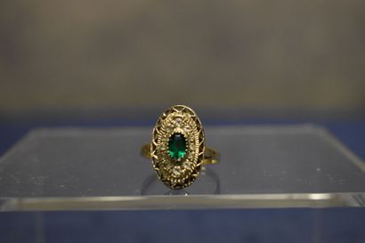 Bague or jaune / or gris 750/°° entourage....