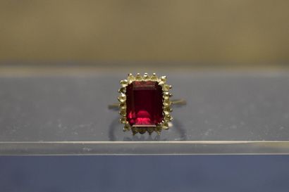 Bague or gris 750/°° entourage pierres de...