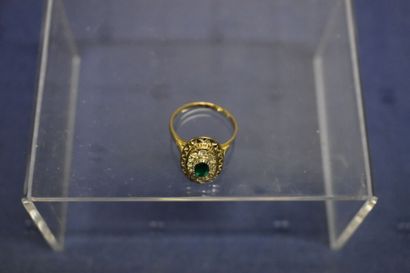 Bague or jaune / or gris 750/°° entourage....